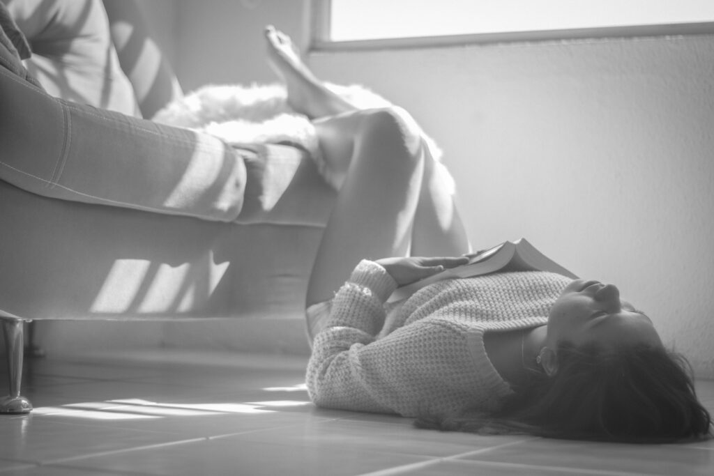 woman laying on the floor