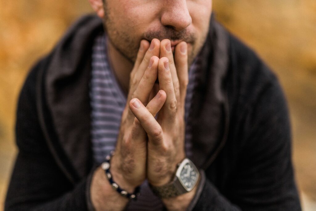 ADHD and Anxiety: When Both Are Present Adult with an expression of quiet tension, representing the overlapping experience of ADHD and anxiety.