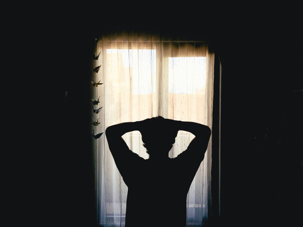 A distressed man alone with his thoughts